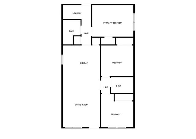 a front view of house with yard and trees in the background