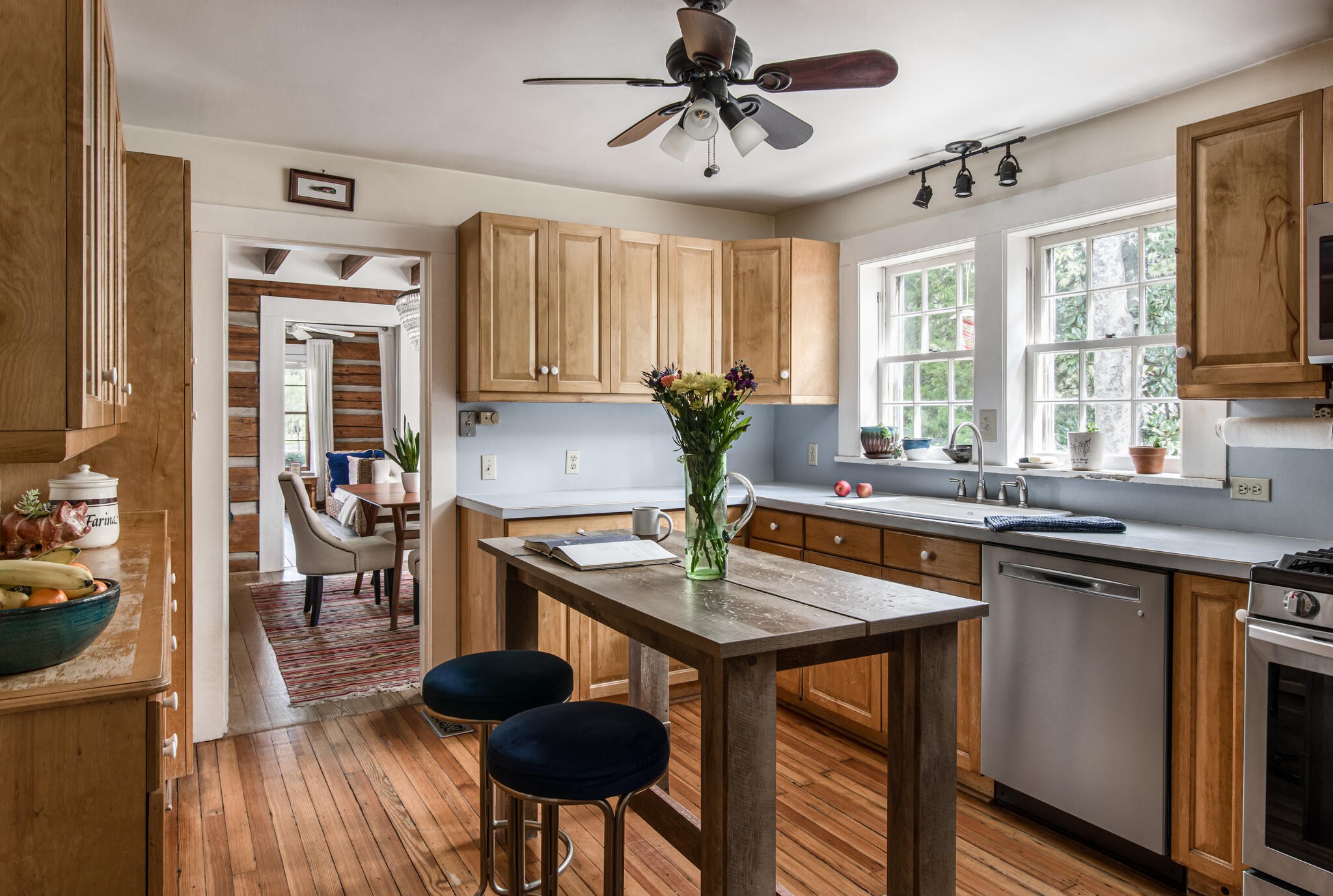 3815 Trimble Road Nashville, TN 37215 - Photo 11 of 31 a kitchen with a table chairs sink and wooden floor