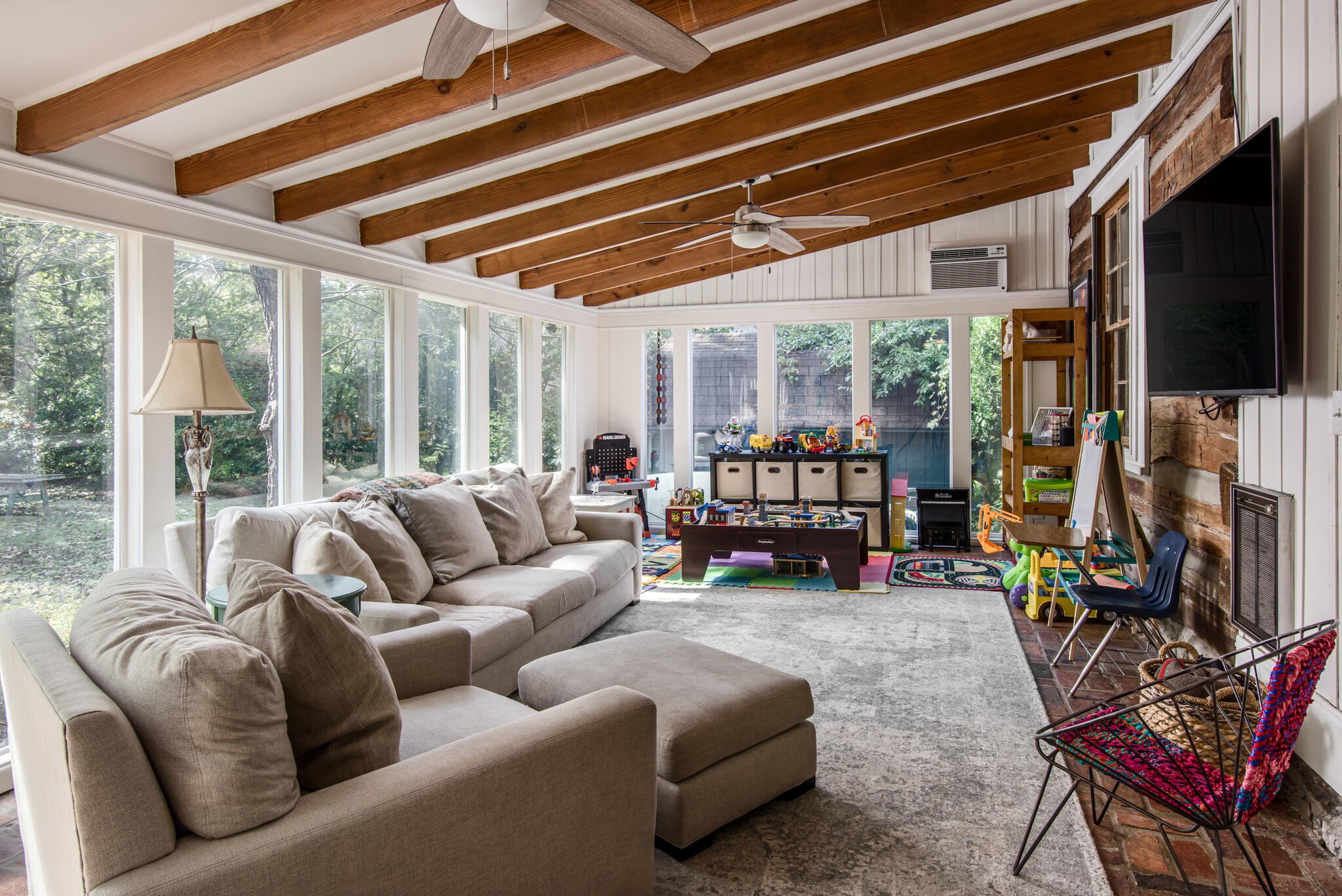 3815 Trimble Road Nashville, TN 37215 - Photo 15 of 31 a living room with furniture a flat screen tv and a window