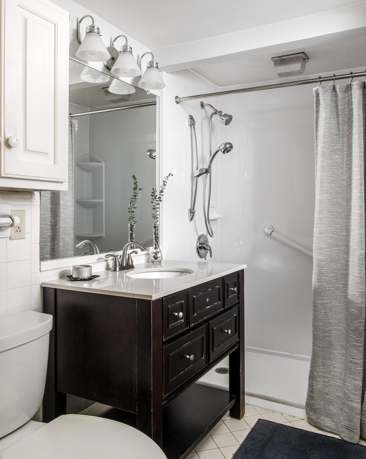 3815 Trimble Road Nashville, TN 37215 - Photo 20 of 31 a bathroom with a sink vanity mirror and toilet