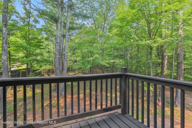a view of a wooden roof deck