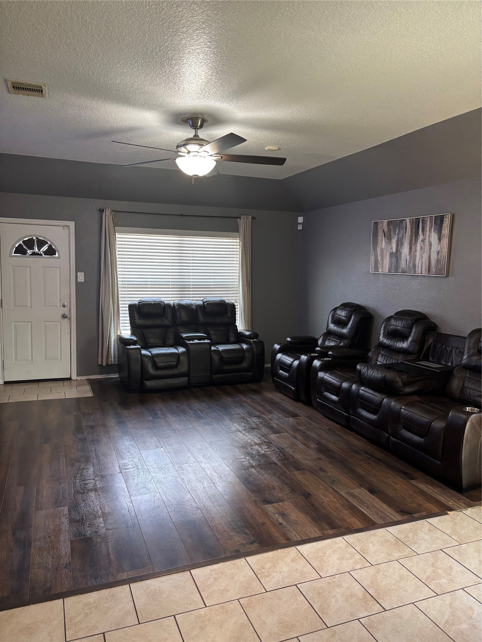 23502 Dukes Run Drive Spring, TX 77373 - Photo 2 of 6 a living room with furniture and a chandelier