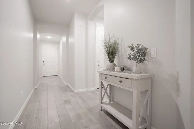 a bathroom with a sink a mirror and vanity