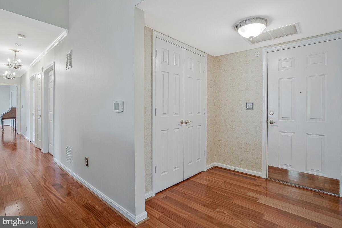12300 Rosslare Ridge Road, Unit 508 Lutherville-Timonium, MD 21093 - Photo 11 of 40 a view of a hallway with wooden floor