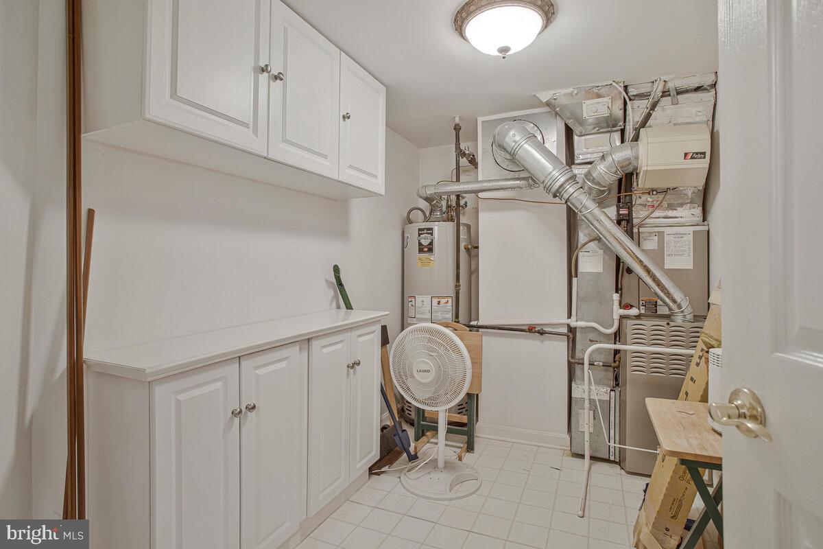 12300 Rosslare Ridge Road, Unit 508 Lutherville-Timonium, MD 21093 - Photo 40 of 40 a view of storage and utility room with racks on the wall