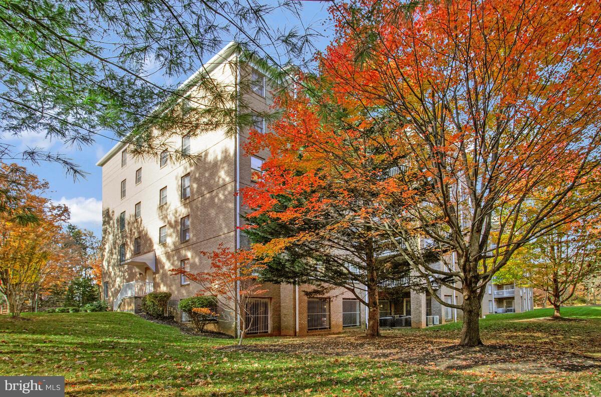 12300 Rosslare Ridge Road, Unit 508 Lutherville-Timonium, MD 21093 - Photo 5 of 40 a view of a house with a yard