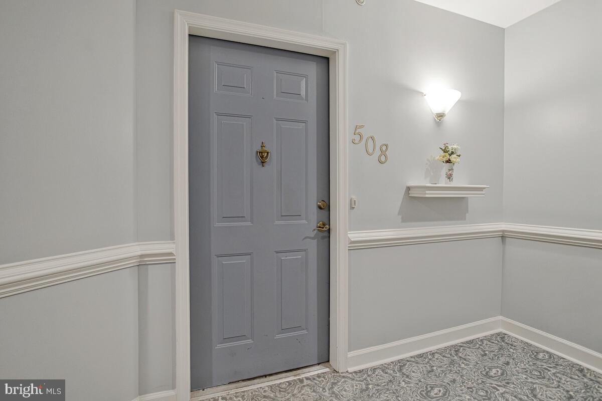 12300 Rosslare Ridge Road, Unit 508 Lutherville-Timonium, MD 21093 - Photo 9 of 40 a bathroom with a sink and vanity