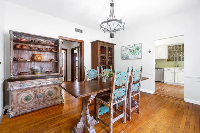 a bedroom with a bed next to a window with the outer view