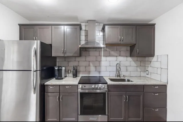 a view of a garden with a tree