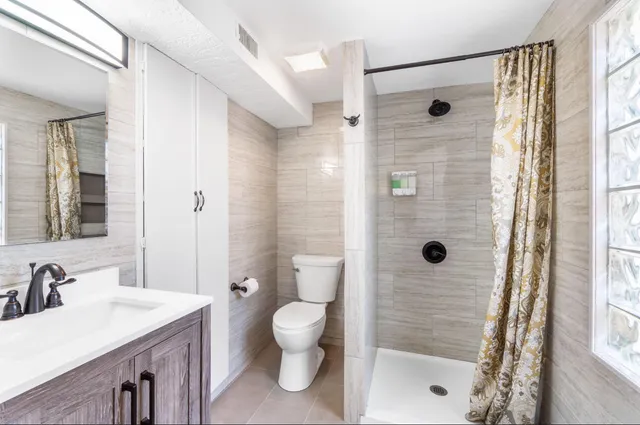 an aerial view of a city with lots of residential buildings