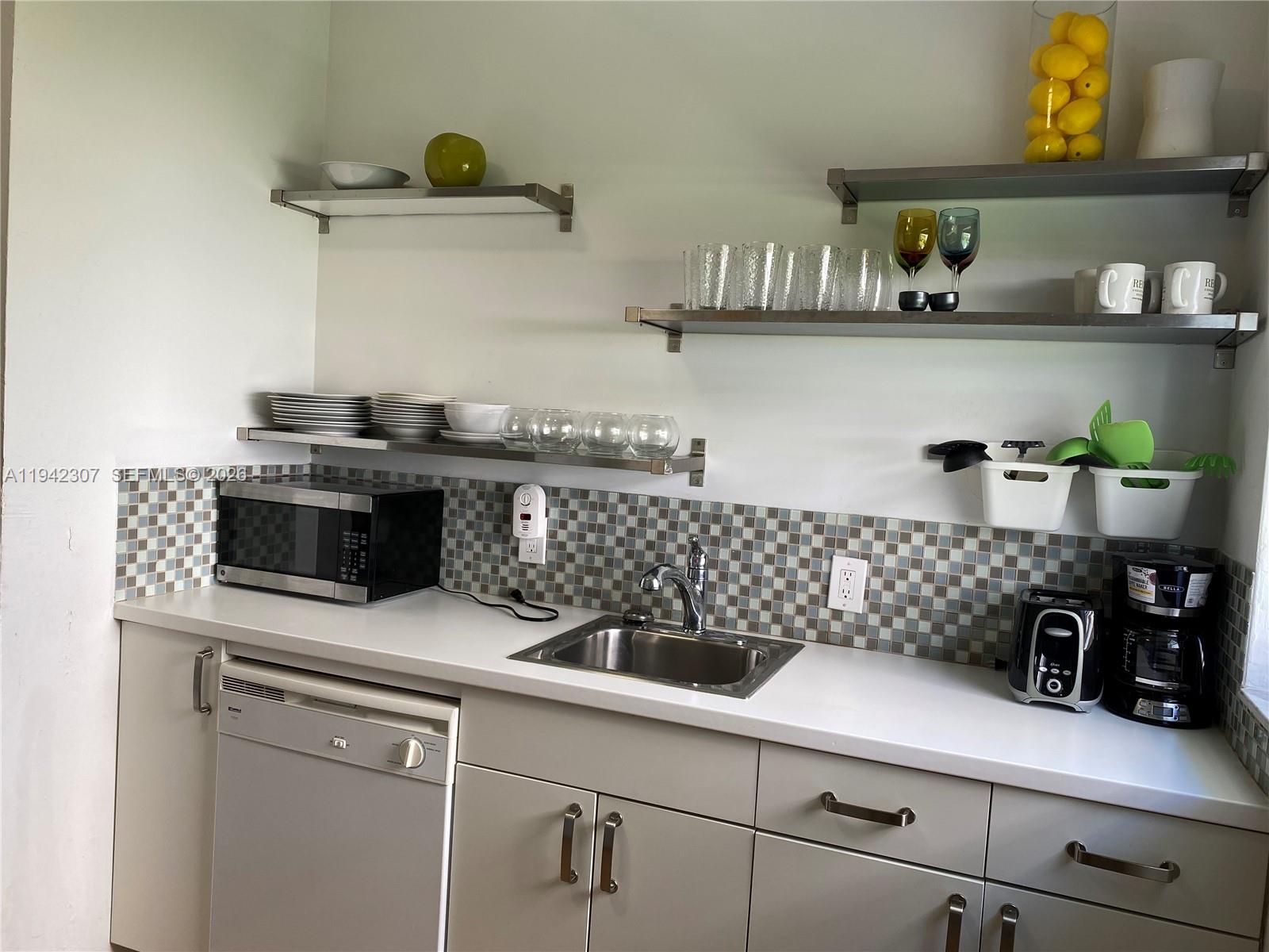 1011 9th Street, Unit 8 Miami Beach, FL 33139 - Photo 10 of 15 Equipped kitchen.
