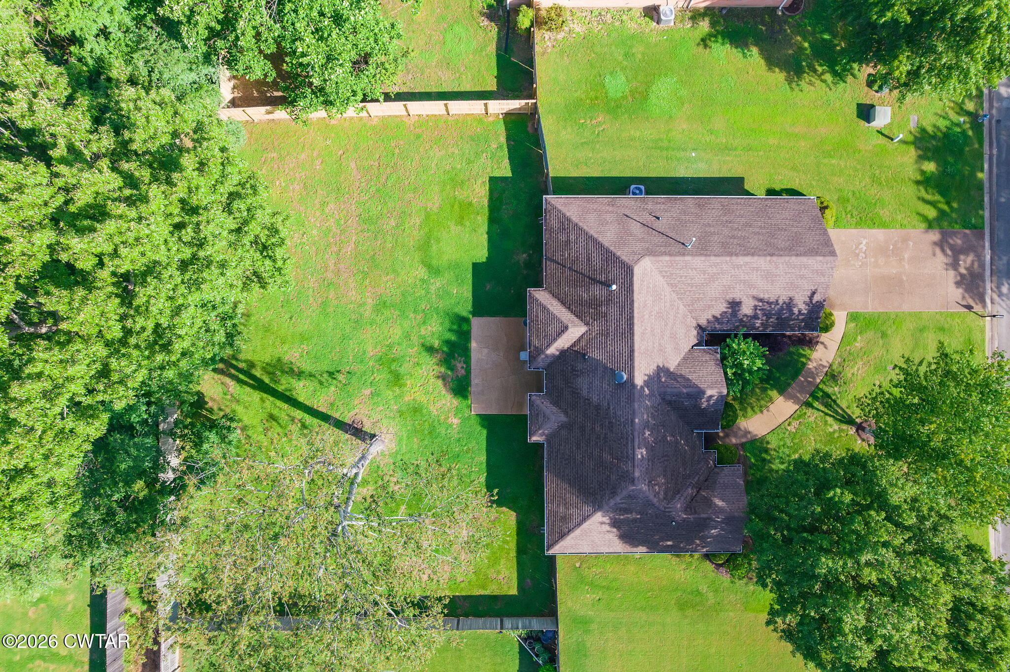 96 Sundown Drive Jackson, TN 38305 - Photo 27 of 28 an aerial view of a house with a yard