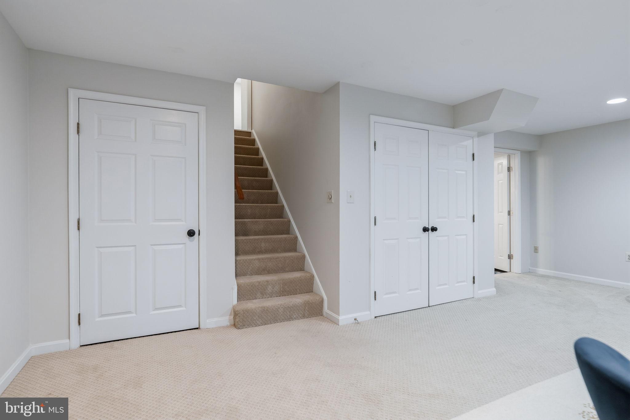 7603 Modisto Lane Springfield, VA 22153 - Photo 41 of 57 a view of an empty room with stairs and ventilation