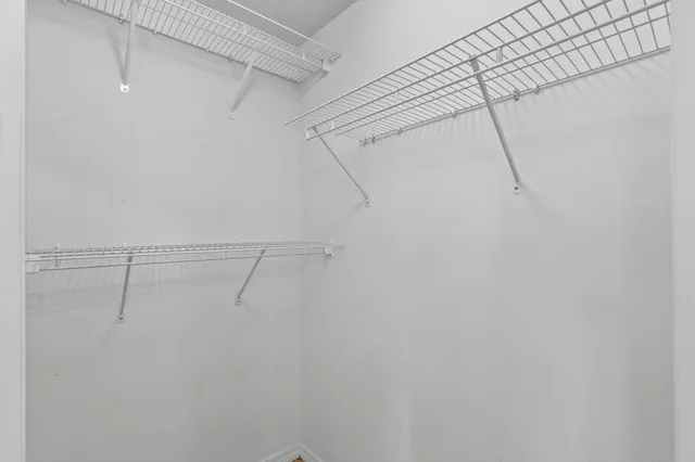 a view of a room with racks on the wall