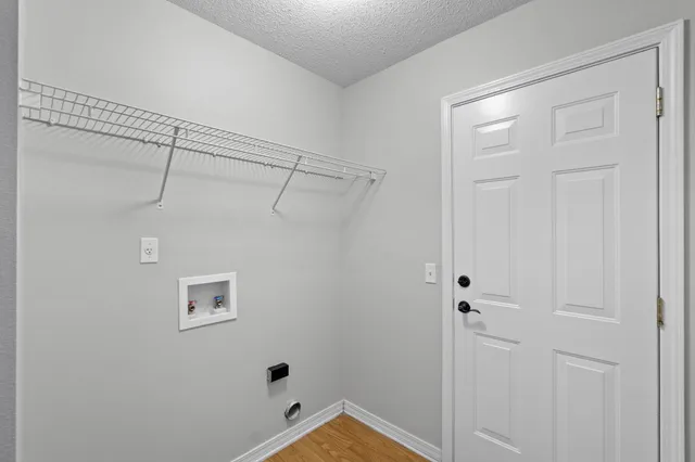 a view of a room with rack on the wall