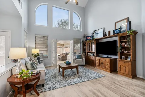a view of living room with furniture and a rug