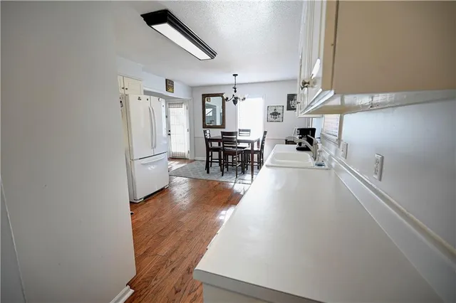 a view of a living room and dining room
