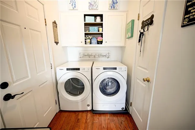 a utility room with dryer and washer