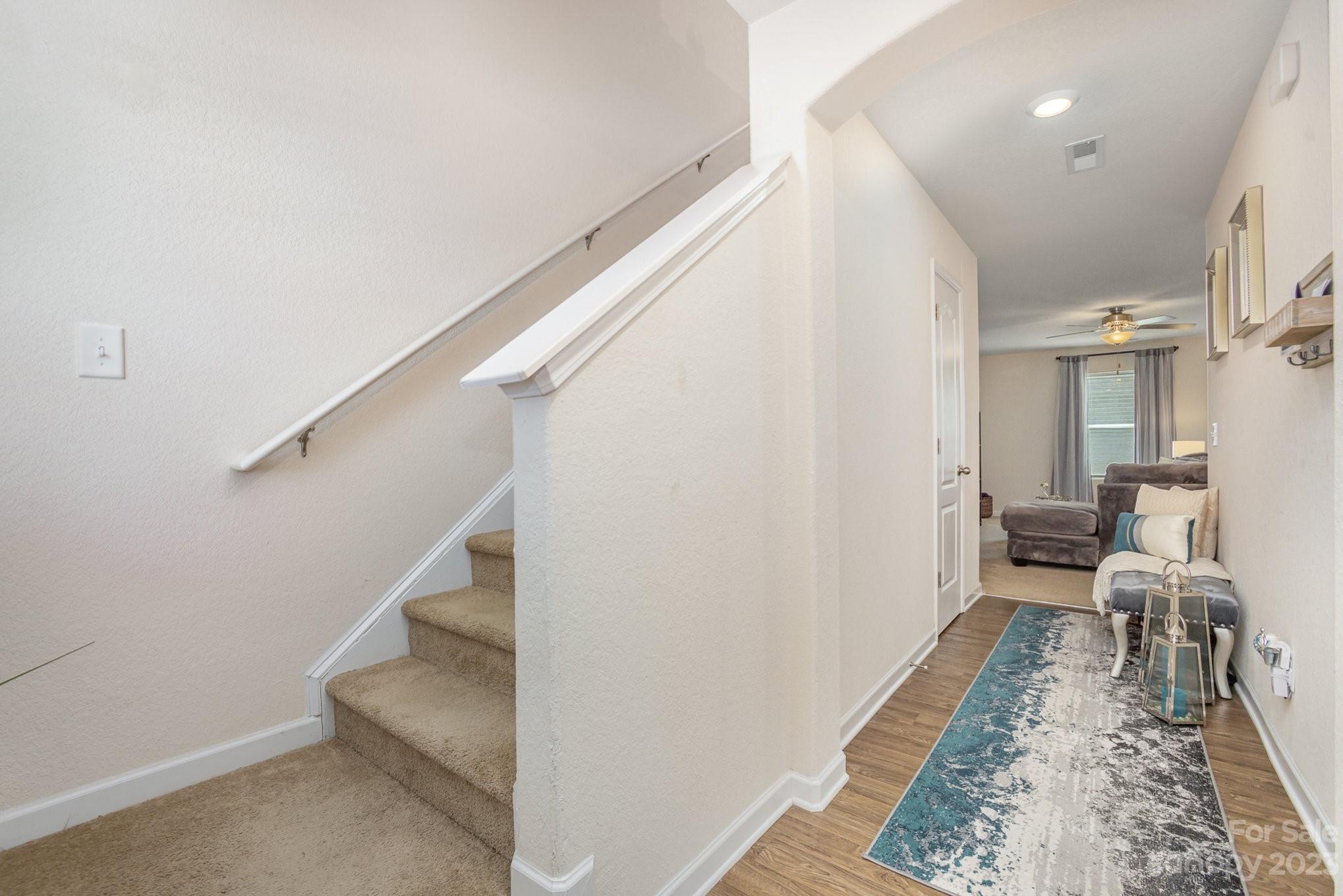 3201 Ellingford Road Charlotte, NC 28214 - Photo 16 of 29 a living room with furniture and a rug
