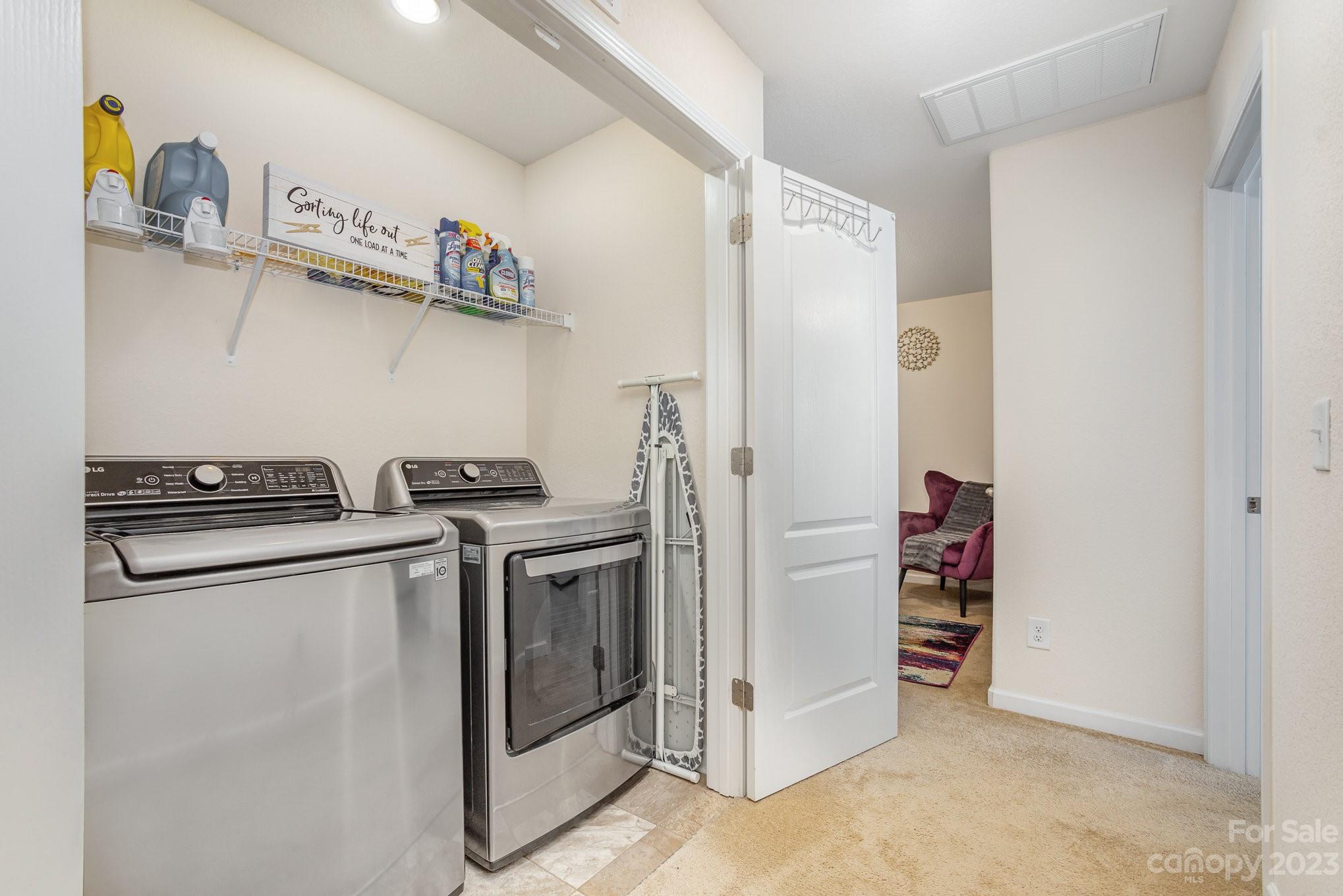 3201 Ellingford Road Charlotte, NC 28214 - Photo 26 of 29 a view of storage and utility room with washer and dryer