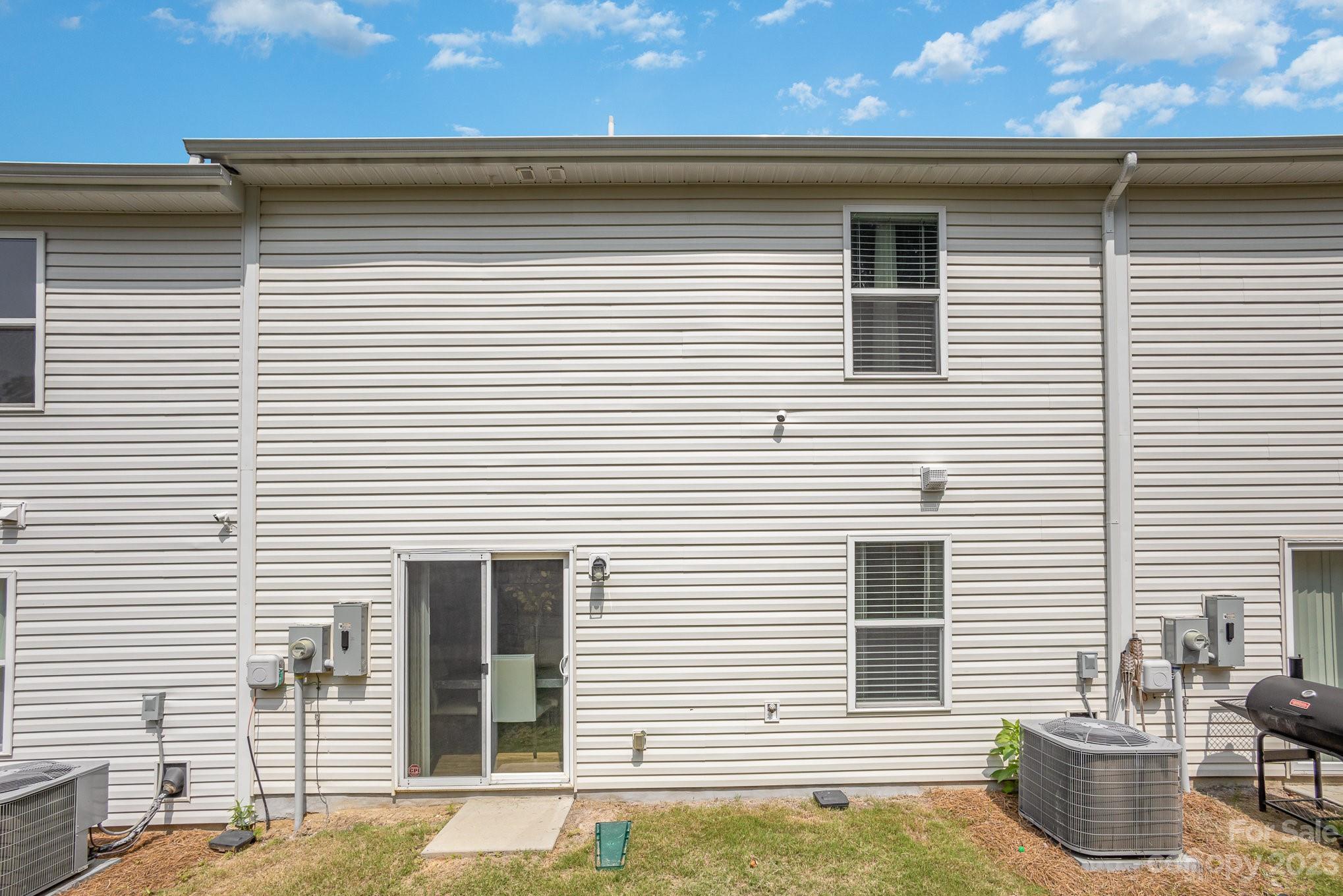3201 Ellingford Road Charlotte, NC 28214 - Photo 28 of 29 a view of a house and a large window