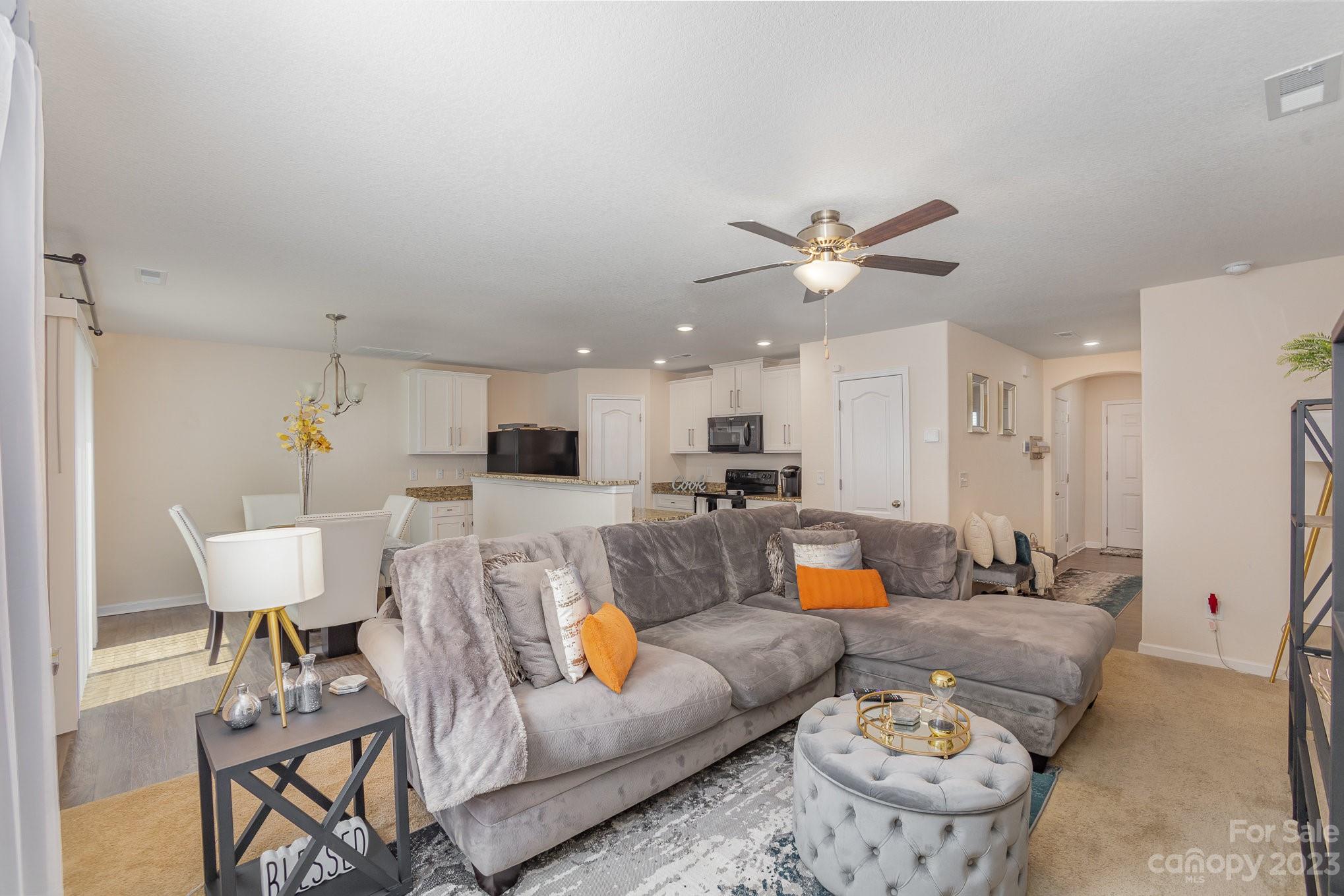 3201 Ellingford Road Charlotte, NC 28214 - Photo 7 of 29 a living room with furniture and kitchen view