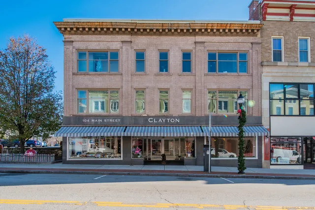 a front view of a building with street view
