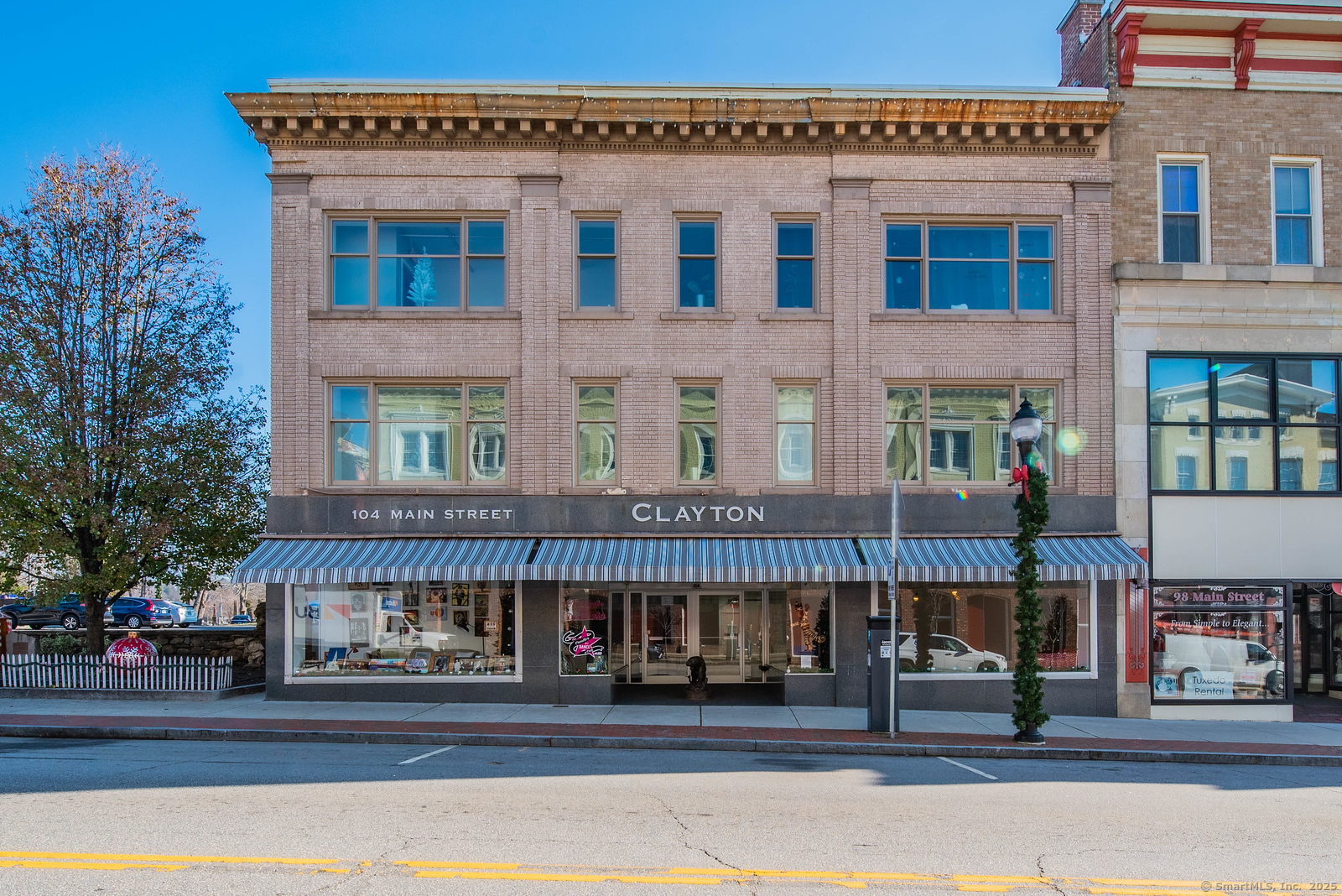 a front view of a building with street view