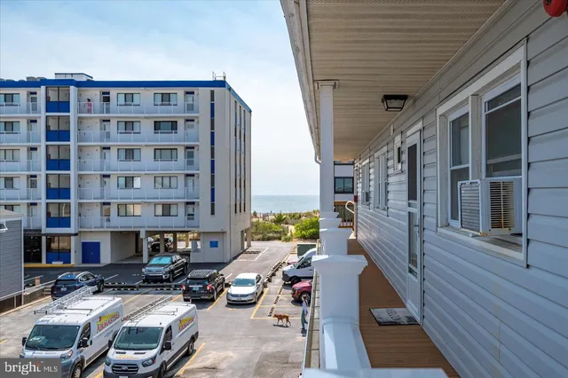 a front view of a building with street view