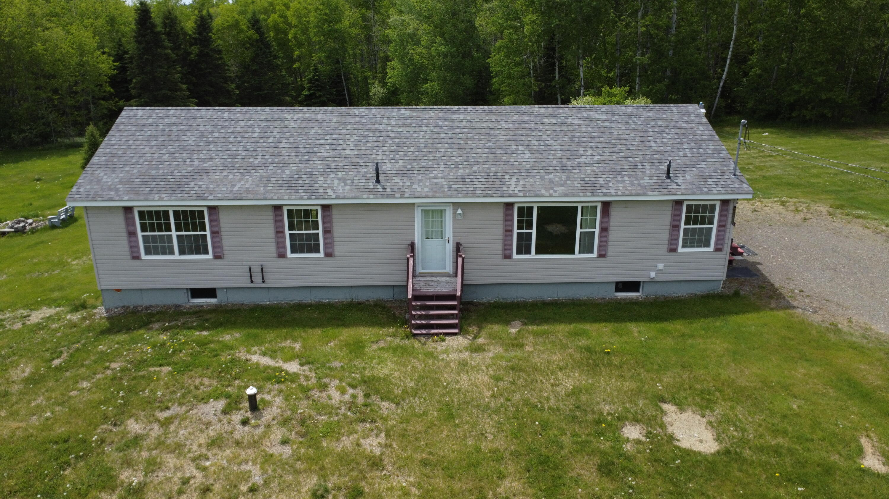 237 Grimes Road Caribou, ME 04736 - Photo 2 of 46 dji_fly_20260605_140630_430_178068283338