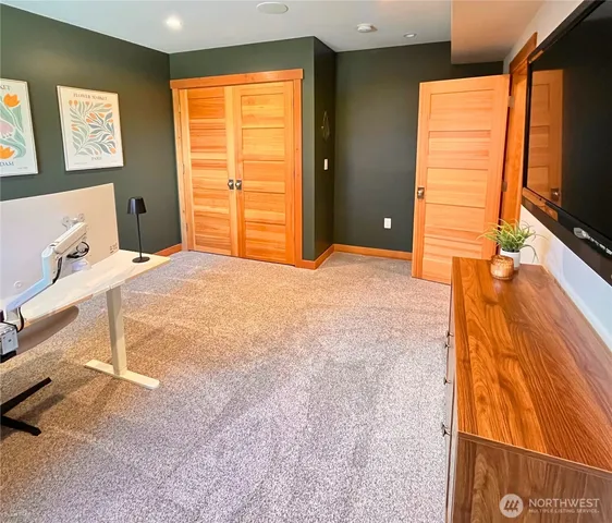 a view of a chairs and table in patio
