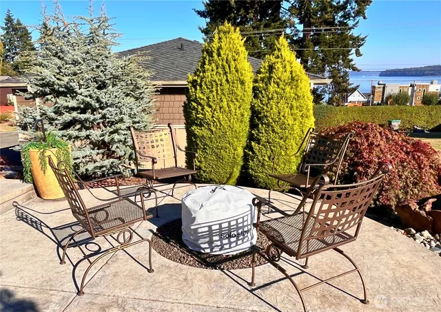 a view of an outdoor space with lounge chair