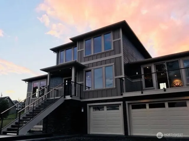 a view of a city with an ocean