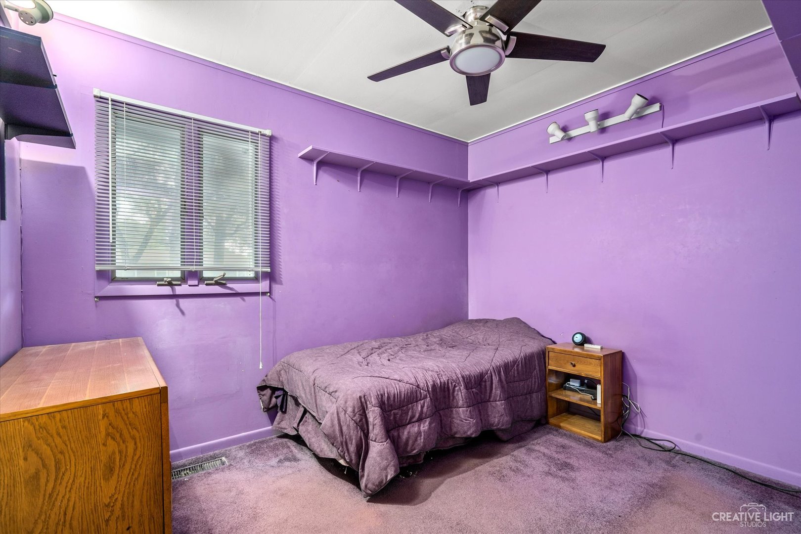 464 Davis Road Batavia, IL 60510 - Photo 11 of 17 a bedroom with a bed and a dresser