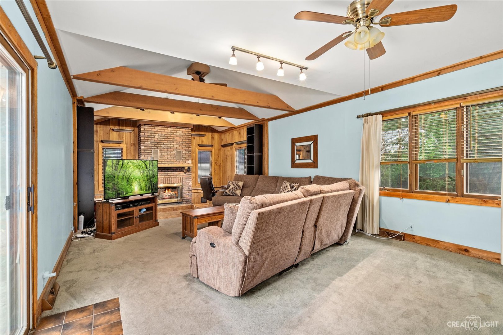 464 Davis Road Batavia, IL 60510 - Photo 3 of 17 a living room with furniture large window with flat screen tv