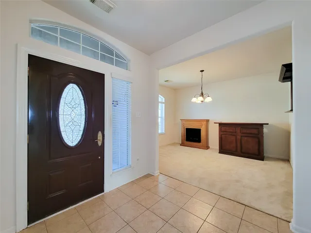 a view of a hallway with entryway