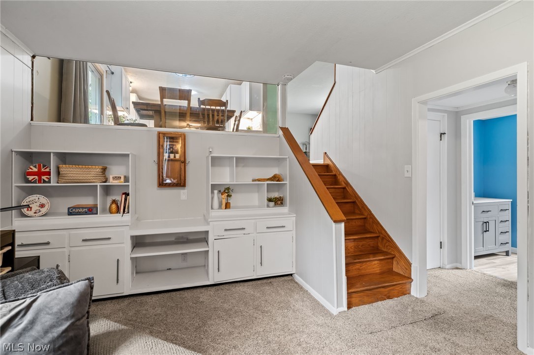 2591 Woodview Road Uniontown, OH 44685 - Photo 19 of 46 Custom built in shelving and cabinetry for additional storage.