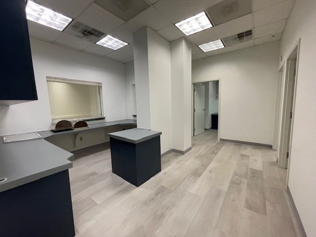 10 Hawthorne Place, Unit 106 Boston, MA 02114 - Photo 1 of 32 a room with granite countertop lots of counter top space