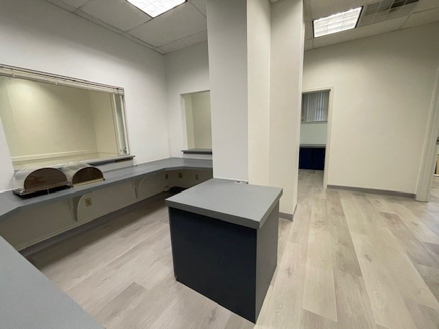 10 Hawthorne Place, Unit 106 Boston, MA 02114 - Photo 16 of 32 a kitchen with a sink and a refrigerator