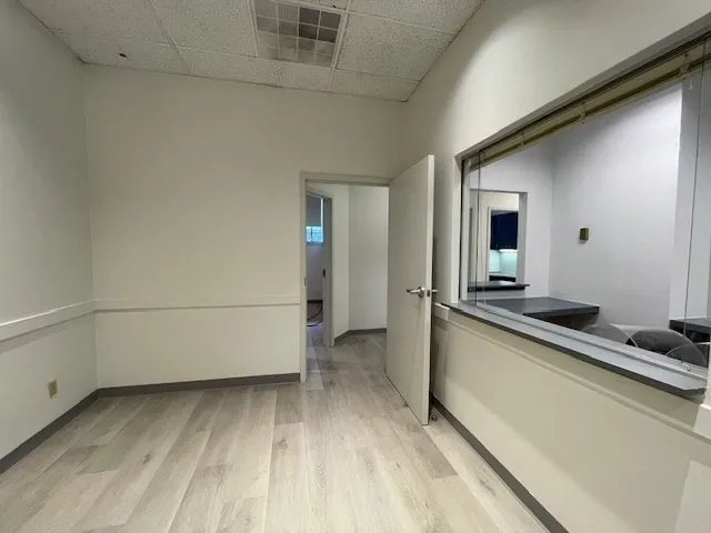 a view of a living room with furniture