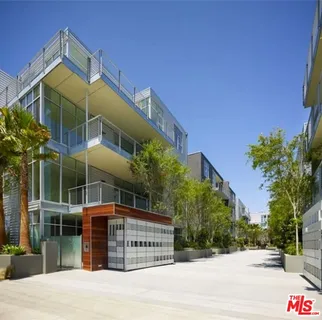 a view of a building with a street