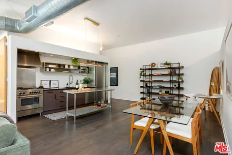 a view of a kitchen with appliances and cabinets
