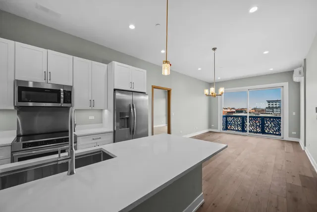 a bedroom with bed and a couch