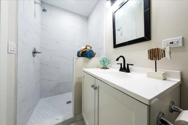a bathroom with a sink and a mirror