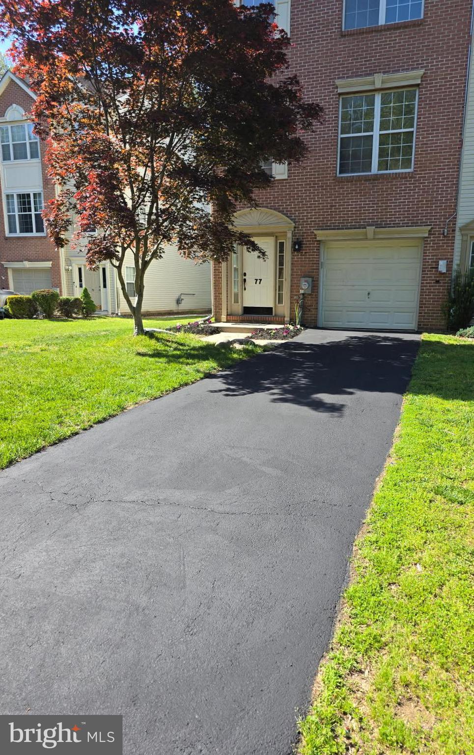 77 Wicklow Road Bear, DE 19701 - Photo 12 of 54 a view of a house with a yard and garage