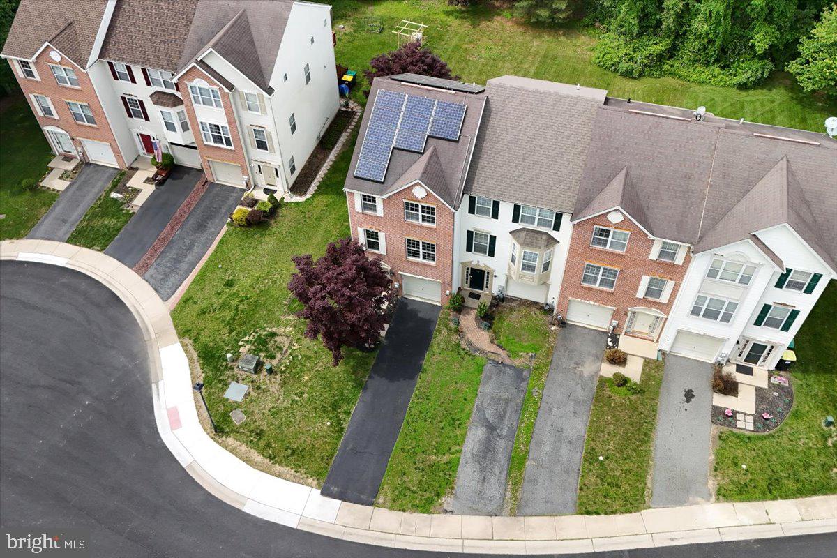 77 Wicklow Road Bear, DE 19701 - Photo 17 of 54 an aerial view of multiple houses with yard