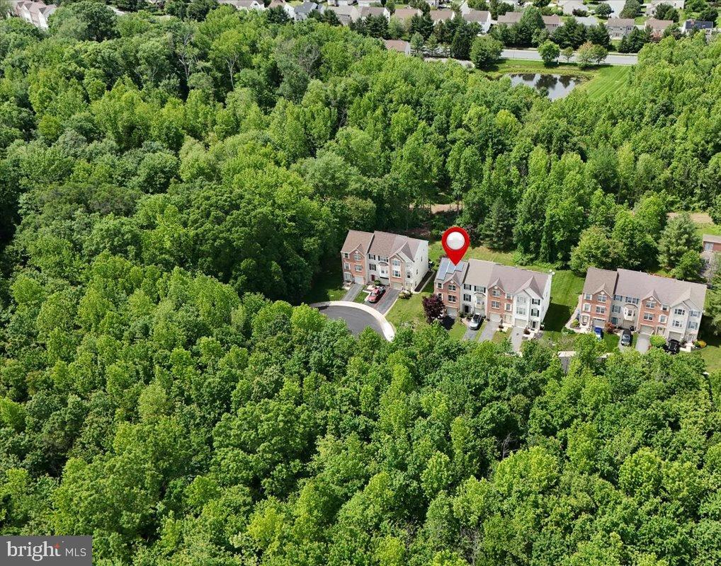 77 Wicklow Road Bear, DE 19701 - Photo 2 of 54 an aerial view of a house with a yard and outdoor seating