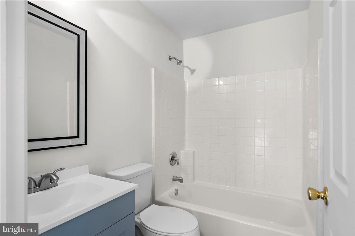 77 Wicklow Road Bear, DE 19701 - Photo 32 of 54 a bathroom with a sink toilet and shower