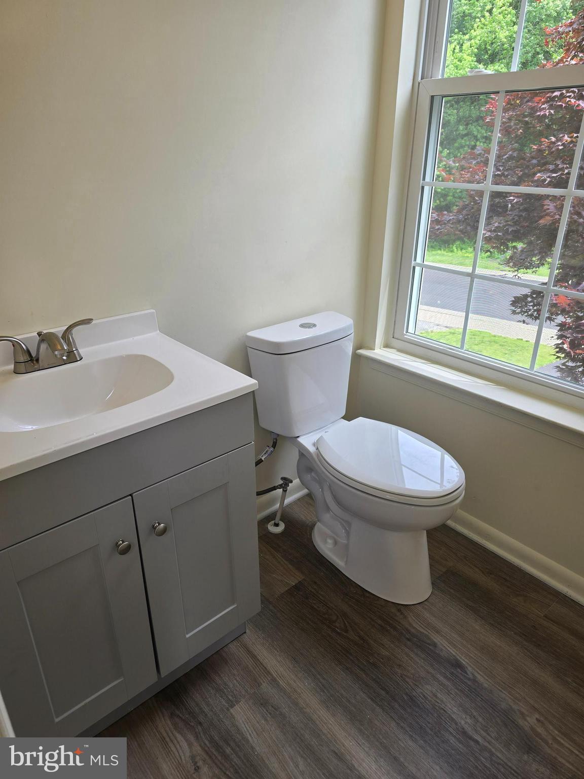 77 Wicklow Road Bear, DE 19701 - Photo 35 of 54 a bathroom with a toilet sink and a window