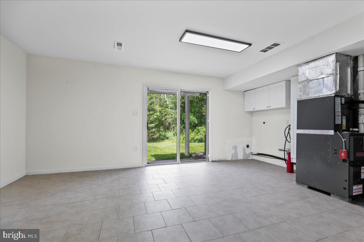 77 Wicklow Road Bear, DE 19701 - Photo 37 of 54 a view of an empty room with a window